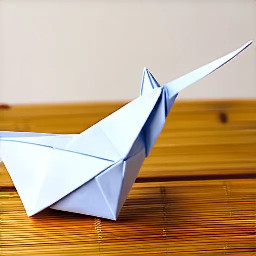 An origami crane on a bamboo table